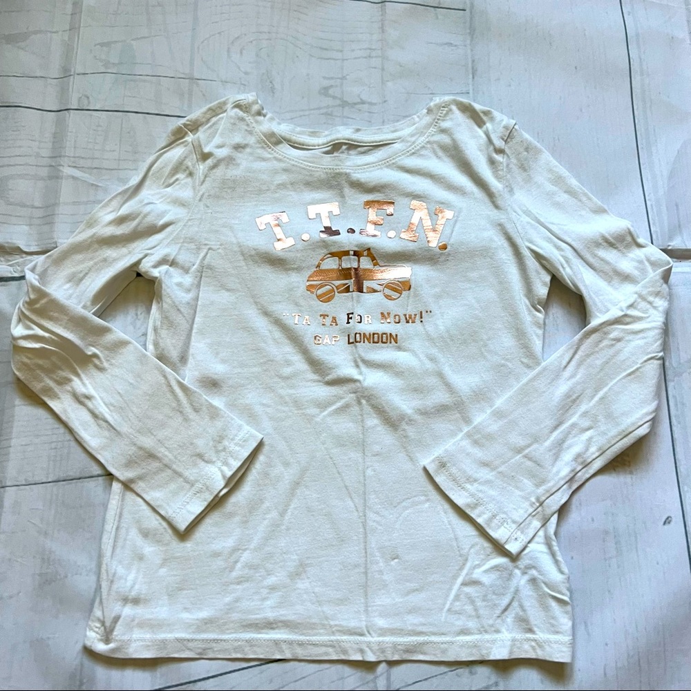 GAP London Size Small White Ling Sleeved Shirt with Gold Lettering on Front